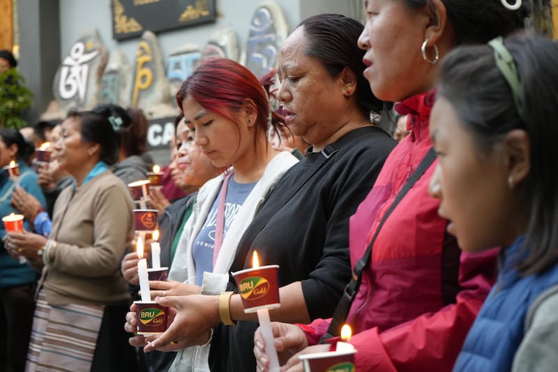 Devotees of revered Tibetan Buddhist monk Tulku Hungkar Dorjee take part in a candlelight vigil in Dharamsala, India, April 11, 2025.