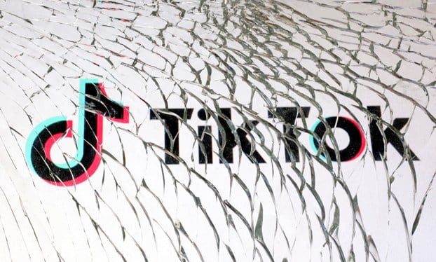 China bans Uyghurs from using social media apps