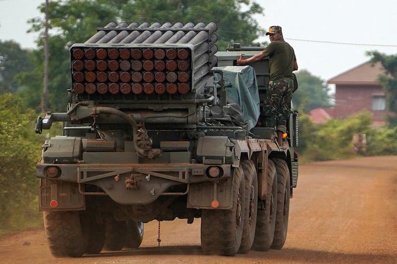 A Cambodian soldier on a BM-21 Grad multiple rocket launcher, around 40 km (24 miles) from the disputed Ta Moan Thom temple in Oddar Meanchey province, July 25, 2025.