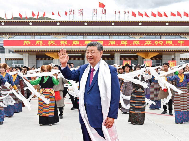 Chinese President Xi Jinping waves upon his arrival in Lhasa, Tibet Autonomous Region, Aug. 20, 2025.