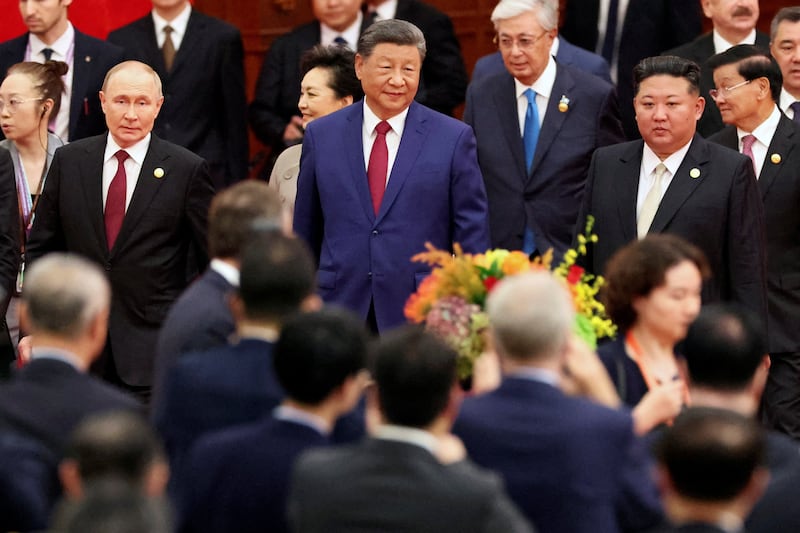 Chinese President Xi Jinping, Russian President Vladimir Putin and North Korean leader Kim Jong Un arrive for a reception marking the 80th anniversary of the end of World War II, at the Great Hall of the People in Beijing, Sept. 3, 2025.