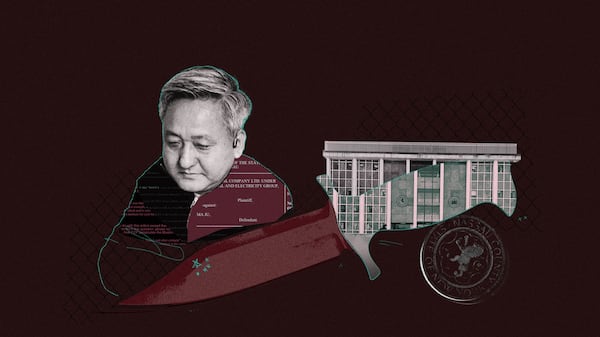 He escaped China. Harassment followed him to a New York courtroom