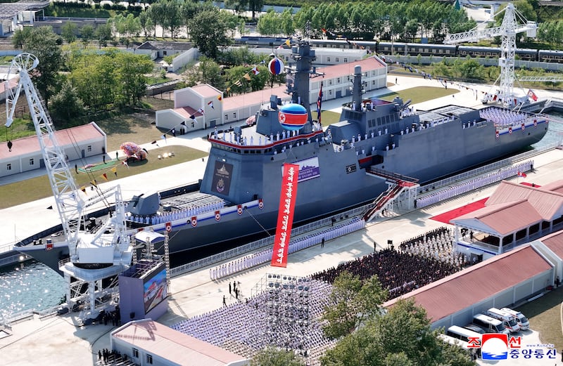 This image released by the North Korean government on June 12, 2025, and not independently verified shows the launching ceremony of the repaired navy destroyer in Rajin, North Korea.